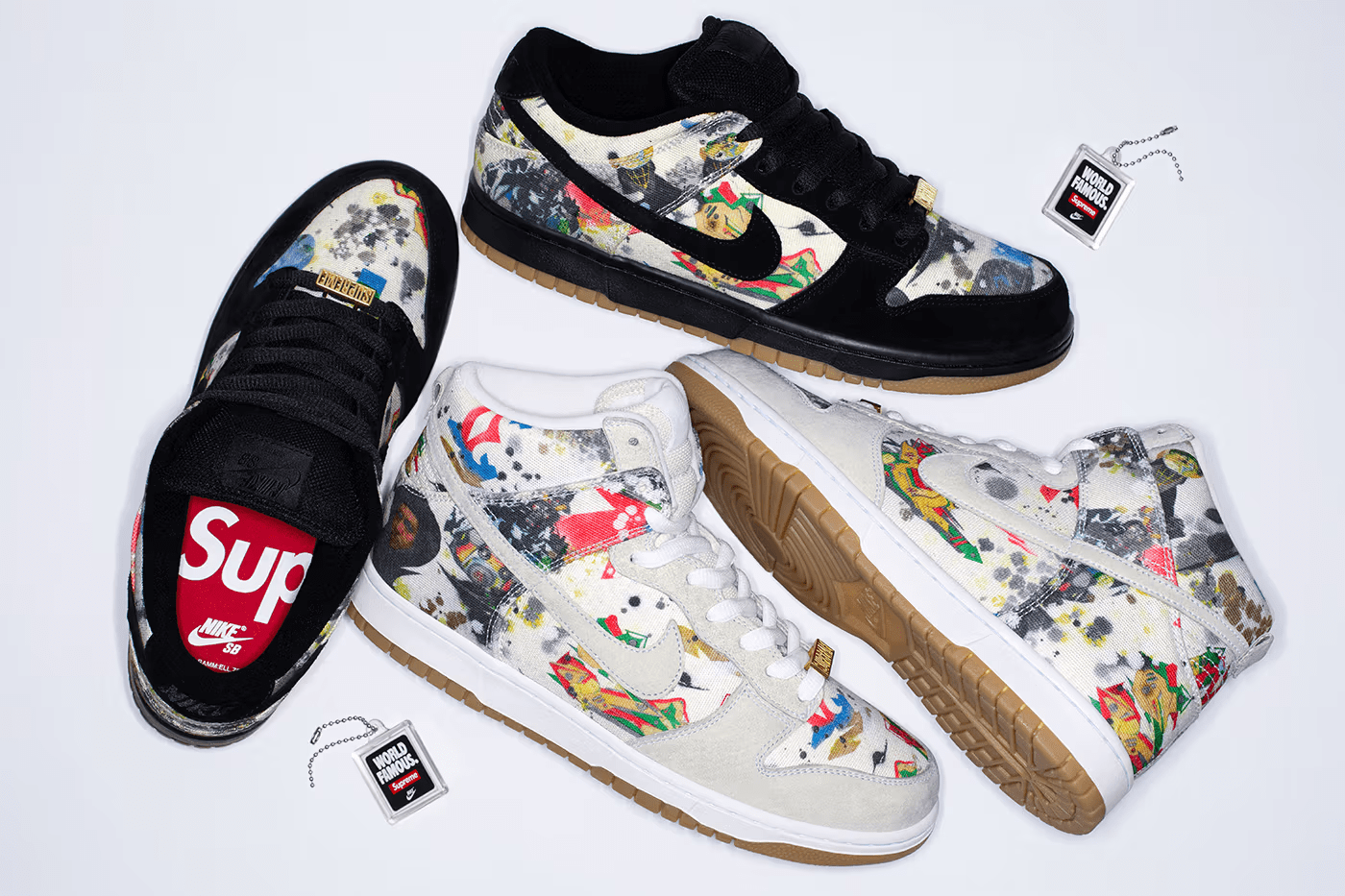 Limitierte Auflage der Supreme SB Dunks mit Schwarz-Weiß-Graffiti-Design und bunten Akzenten, inklusive Anhänger mit der Aufschrift 'World Famous'